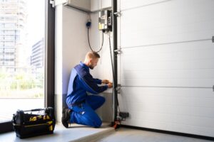 Garage,Door,Installation,And,Repair,At,Home.,Contractor,Man,In