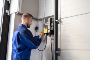 Garage,Door,Installation,And,Repair,At,Home.,Contractor,Man,In
