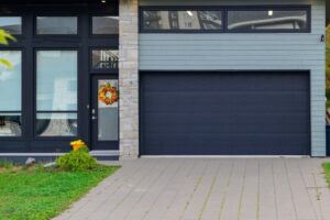 A,Modern,Black,Panel,Metal,Exterior,Garage,Door.,The,Elegant